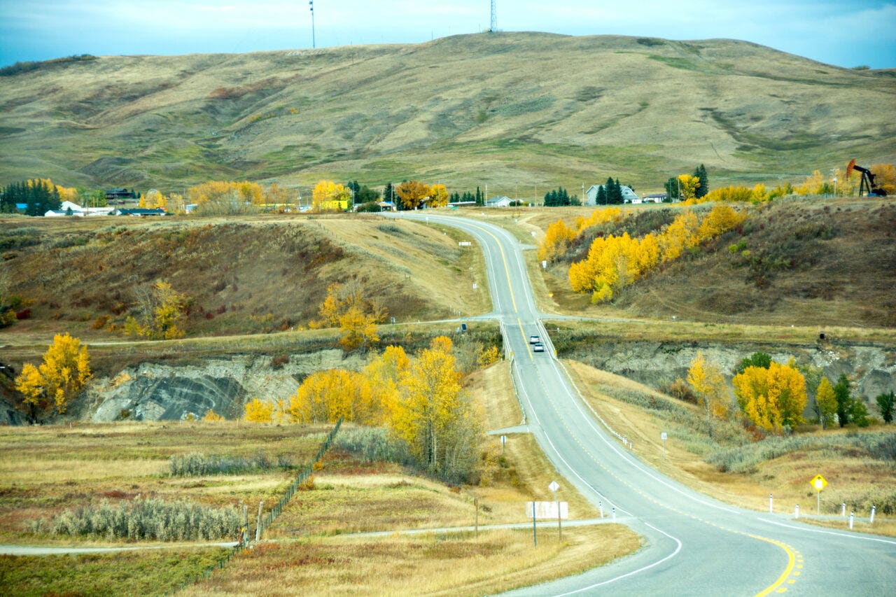 Approaching Longview on the Cowboy Trail during autumn.