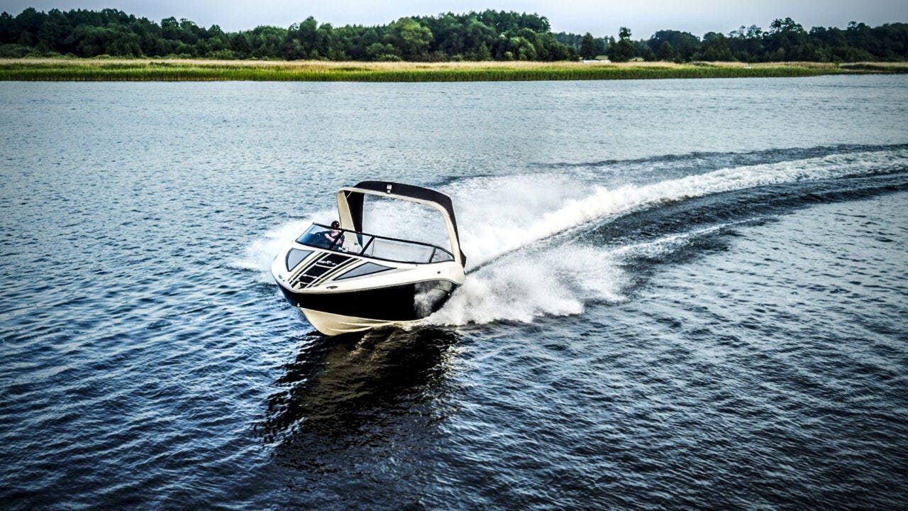 A powerboat on a lake in Alberta.