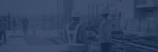 Construction workers on site having a discussion