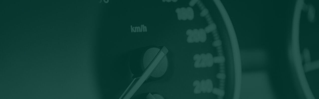 An odometer with a dark green image overlay