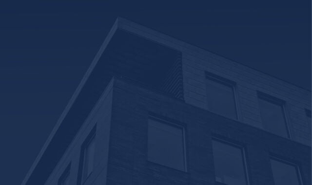 Commercial real estate building exterior with a navy blue overlay