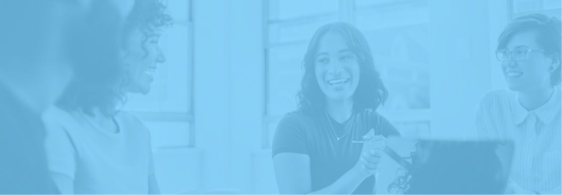 a team of insurance brokers sitting around a table talking, with a sky blue overlay, highlighting careers at Acera insurance