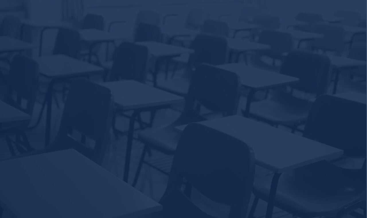 View of empty desks in a school classroom