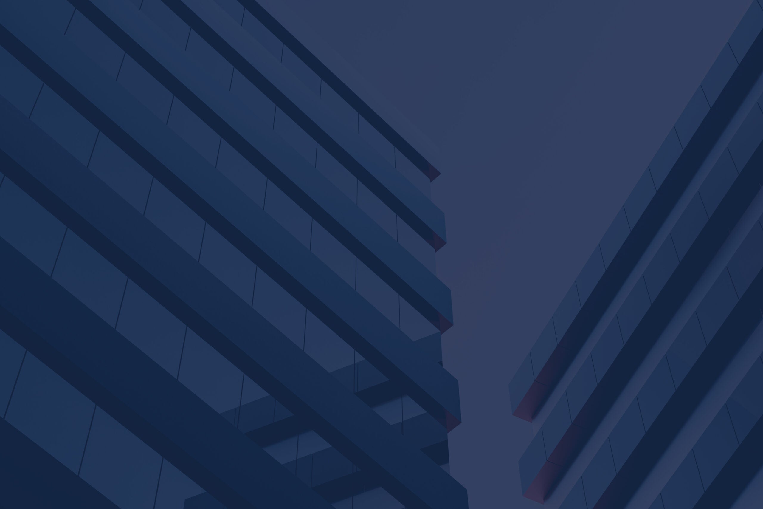 View from below of tall buildings with sky in the background