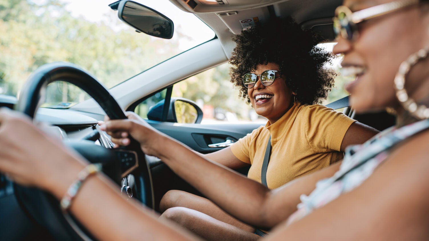 A driver and a passenger in a vehicle